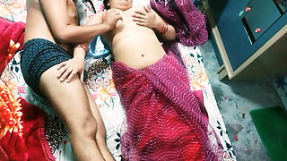 Beautiful Indian Bhabhi in Red Colour Saree.