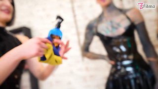Latex Dominatrix Trio Sound & Finger the Tattooed Slave’s Cock