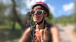 Sweaty Bike Ride to the River – She Strips Nude, Sunbathes and Gives Herself a Risky Outdoor Fingering with a Real Close-Up Squirt