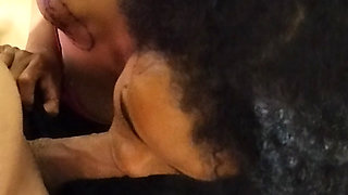 Shy young girl sucking hot