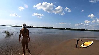 Big-Ass Blonde's Naked Walk on a Paddleboard