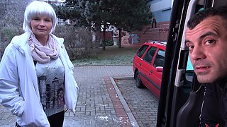 Mature Clarisa in a pick-up truck, her periwig flowing