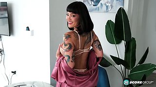 Asian MILF Kitty, 42, fingers her mature pussy