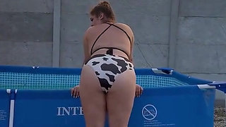 Cowgirl Swimsuit Farting in the Pool Outside