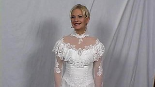 A slutty bride gets fucked by a guy at the dress shop