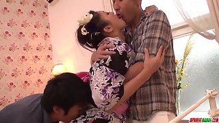 Kimono-clad Japanese MILF Reiko Kobayakawa gets double-teamed by two dudes in a wild threesome