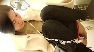 Cute amateur asian web cam girl playing with her toy