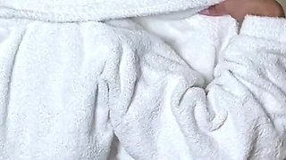 Mature Woman Takes off Her Clothes Except Her Bra in the Bathroom