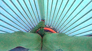 Masturbating in public tanning bed