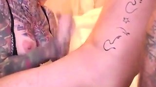 Tattooed Amateur Gives Lucky Man Intense Webcam Blowjob