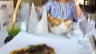 Bold Amateur Chick Gives Footjob Under Restaurant Table