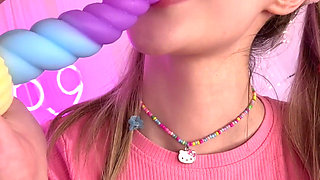 Toy in Mouth with an Innocent Stare