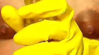 Indian Pregnant Stepsister in Yellow Gloves Plays with a Dildo and Talks Dirty