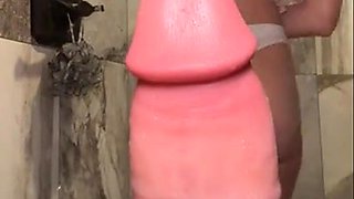 Sensual Christina teases herself with huge toy in steamy session