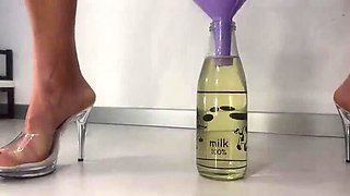 Hairy Mature Wife Peeing in a Bottle Through a Funnel