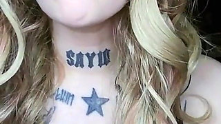 Sexy Alternative Blonde Drinking and Burping