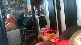 Blonde mature with big boobs masturbates in bed