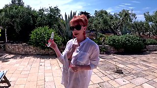 Red XXX feeling horny outside by the pool