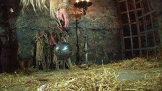 Witch Hangs Upside Down and Gets Drizzled with Black Wax