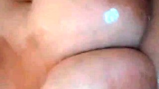 Busty curly brunette with big boobs fucks on couch