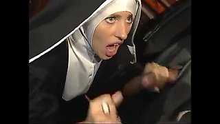 Nasty Nun Andrea Nobili Sucks Two Cocks in Raunchy Italian Threesome