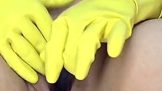Fucking a Glass Dildo with Yellow Gloves