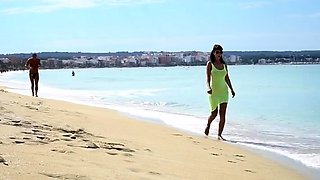 Naughty mom by the sea in see thru Yellow dress flashing