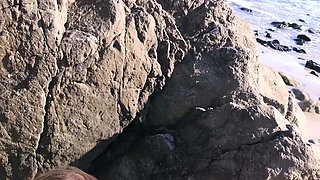 Model blows photographer on the beach and swallows cum