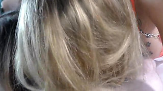 A hairjob with blonde and brunette babes