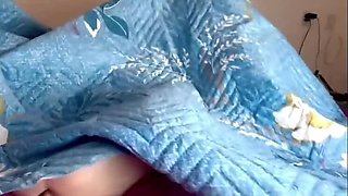 Naughty stepmom sneaks under the duvet and fucks her stepson