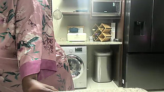 Ebony MILF Moaning and Stripteasing in Kitchen