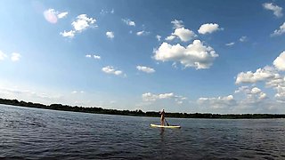 Big-Ass Blonde's Naked Walk on a Paddleboard