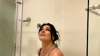 Busty curly brunette with big boobs fucks on couch