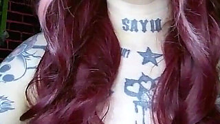 Sexy Alternative Redhead Drinking Soda and Burping