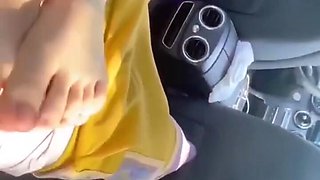 Skinny asian girl gets in his car to give him a footjob pov