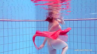 Russian Ariel shows striptease under the water