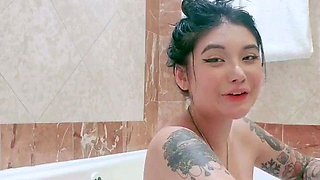 Busty babe playing with her big boobs