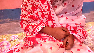 Viral Bangladeshi video of a woman in a saree feeding her younger stepsister.