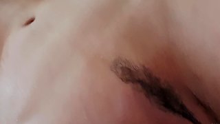 Busty curly brunette with big boobs fucks on couch